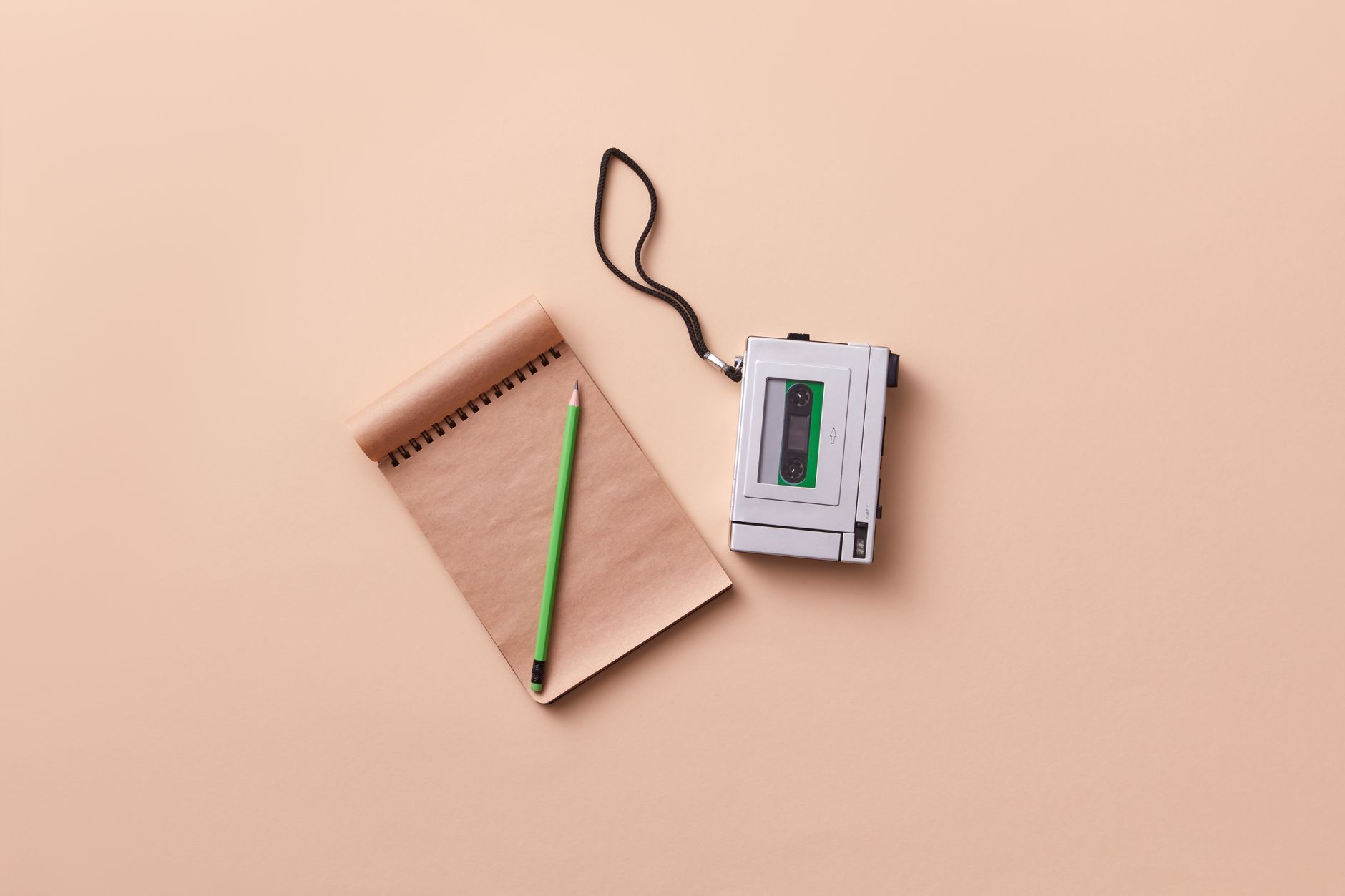 dictaphone and spiral notebook